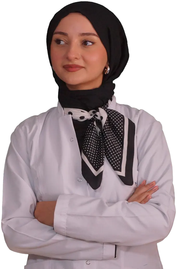 Diyetisyen Yaren Zorlu, beyaz önlüğüyle kollarını kavuşturmuş